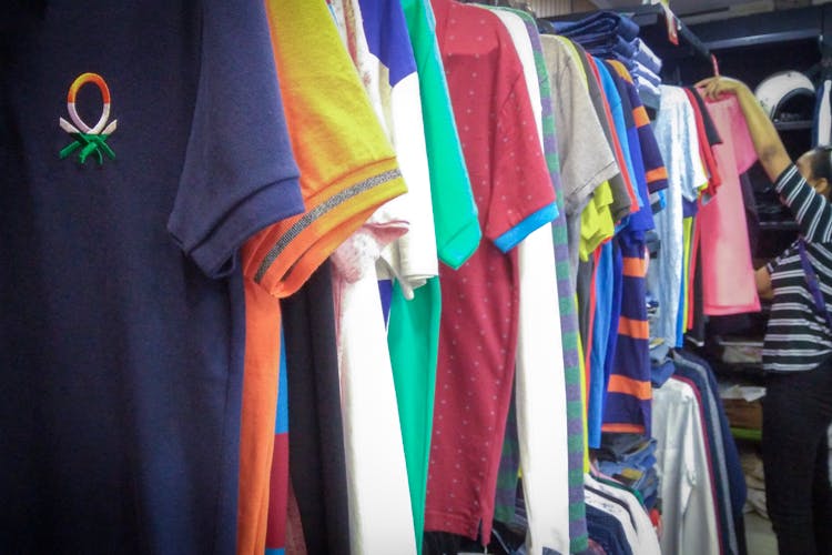 Clothing,Room,T-shirt,Textile,Clothes hanger,Sportswear,Closet,Outerwear,Boutique,Jersey