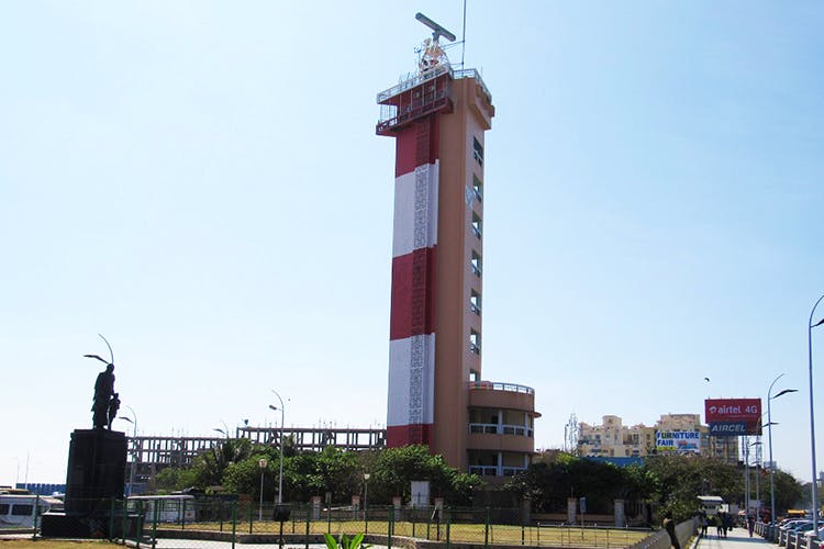 Tower,Landmark,Metropolitan area,Architecture,Building,City,Skyscraper,Tower block,Tree,Monument