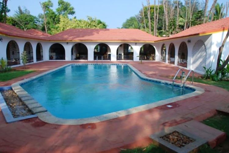 Swimming pool,Resort,Property,Hacienda,Building,Water,Leisure,Real estate,Eco hotel,Villa