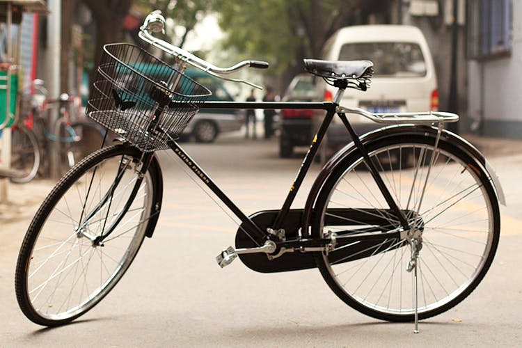 Land vehicle,Bicycle,Bicycle wheel,Bicycle part,Vehicle,Bicycle frame,Bicycle tire,Bicycle handlebar,Bicycle saddle,Bicycle drivetrain part