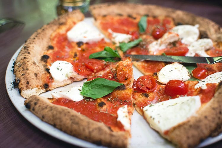 Dish,Food,Pizza,Cuisine,Pizza cheese,Ingredient,Flatbread,California-style pizza,Italian food,Goat cheese