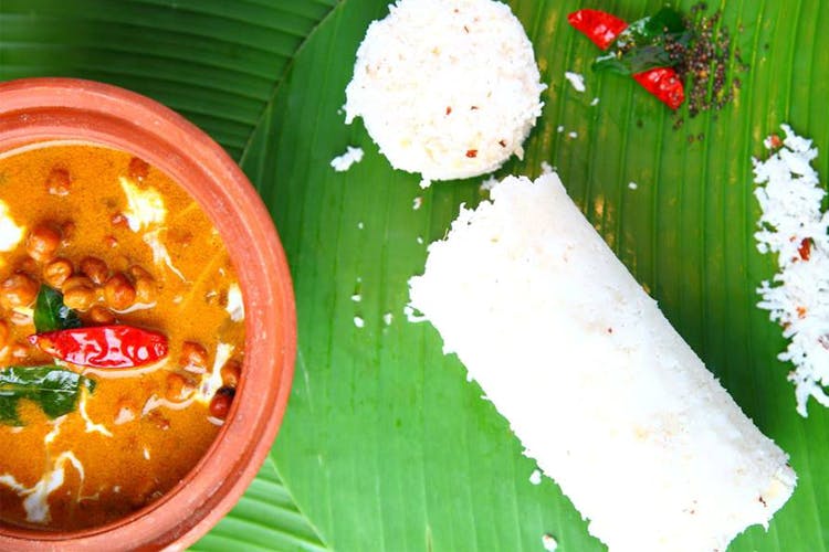 Dish,Food,Cuisine,Sadya,Banana leaf,Leaf,Comfort food,Banana leaf rice,Ingredient,Steamed rice