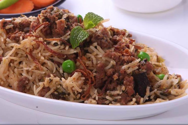 Dish,Cuisine,Food,Spiced rice,Thai fried rice,Ingredient,Biryani,Puliyogare,Rice,Produce