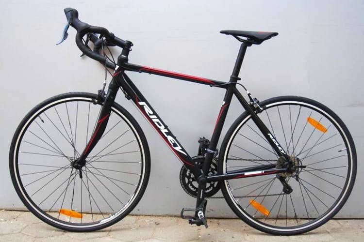 Land vehicle,Bicycle,Bicycle wheel,Bicycle frame,Bicycle part,Vehicle,Bicycle tire,Bicycle handlebar,Bicycle stem,Racing bicycle