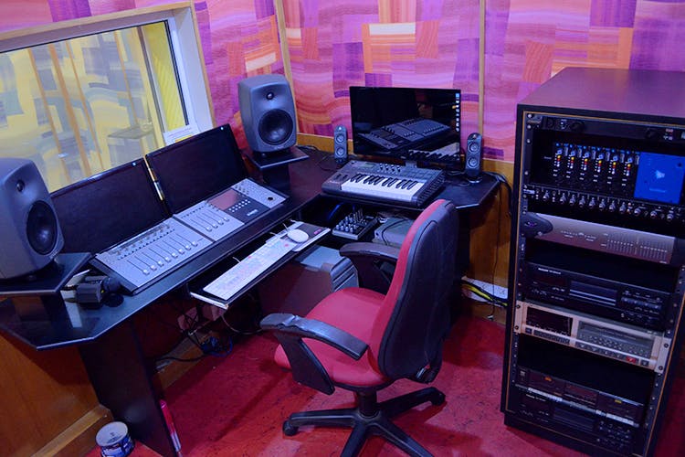 Studio,Music workstation,Recording studio,Electronic instrument,Audio equipment,Computer desk,Technology,Electronic device,Desktop computer,Broadcasting