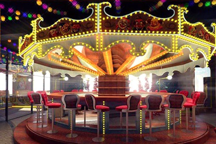 Amusement ride,Amusement park,Carousel,Decoration,Lighting,Recreation,Fun,Park,Function hall,Nonbuilding structure