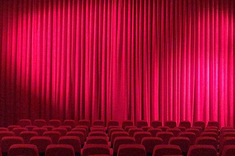 Curtain,Theater curtain,Theatre,Red,Window treatment,heater,Interior design,Stage,Textile,Auditorium