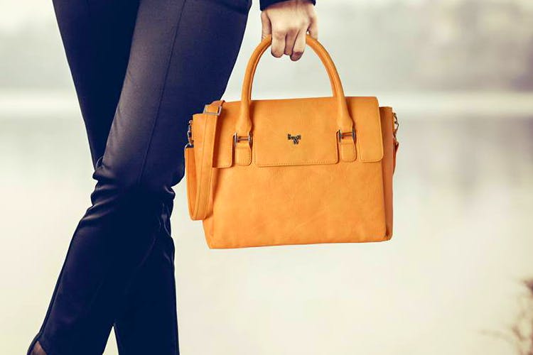 Handbag,Bag,Leather,Tan,Tote bag,Fashion,Fashion accessory,Brown,Yellow,Orange