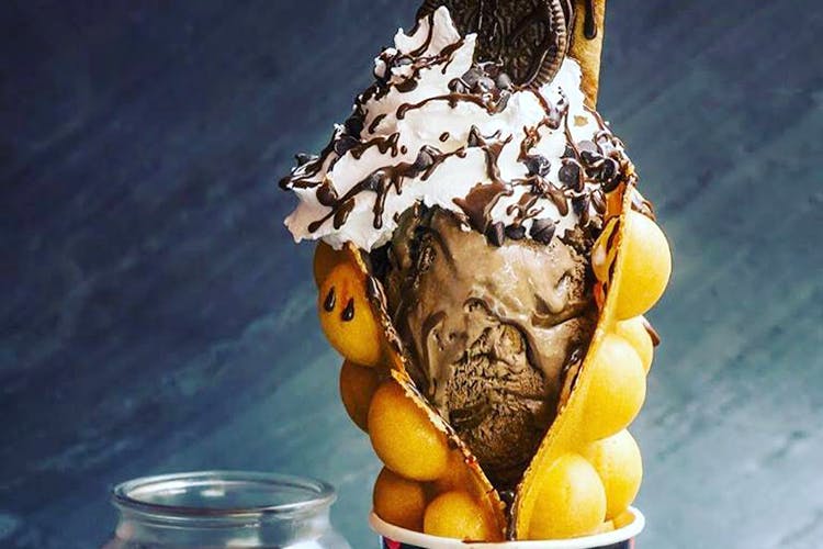 Ice cream,Food,Frozen dessert,Chocolate ice cream,Sundae,Dessert,Cuisine,Dairy,Ingredient,Gelato