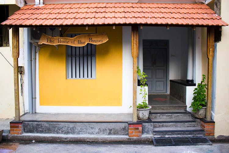 Property,House,Yellow,Building,Roof,Architecture,Window,Real estate,Door,Home