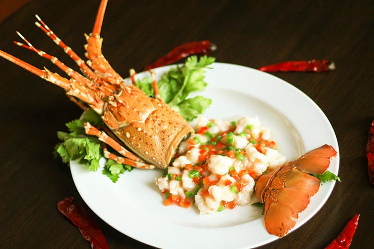 Dish,Food,Cuisine,Ingredient,Lobster thermidor,Seafood,À la carte food,Spiny lobster,Produce,Garnish