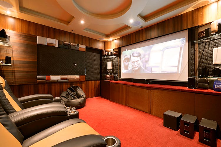 Room,Building,Interior design,Furniture,Home cinema,Technology,Recording studio,Electronic device,Audio equipment,Conference hall