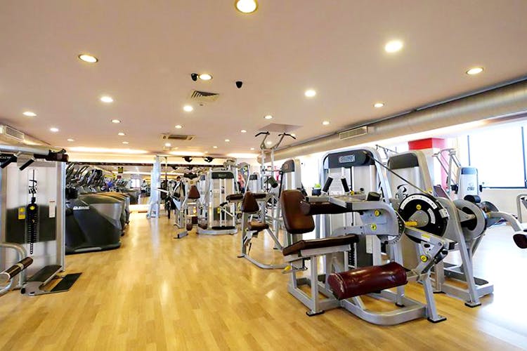 Gym,Room,Sport venue,Physical fitness,Property,Real estate,Floor,Exercise equipment,Flooring,Leisure centre