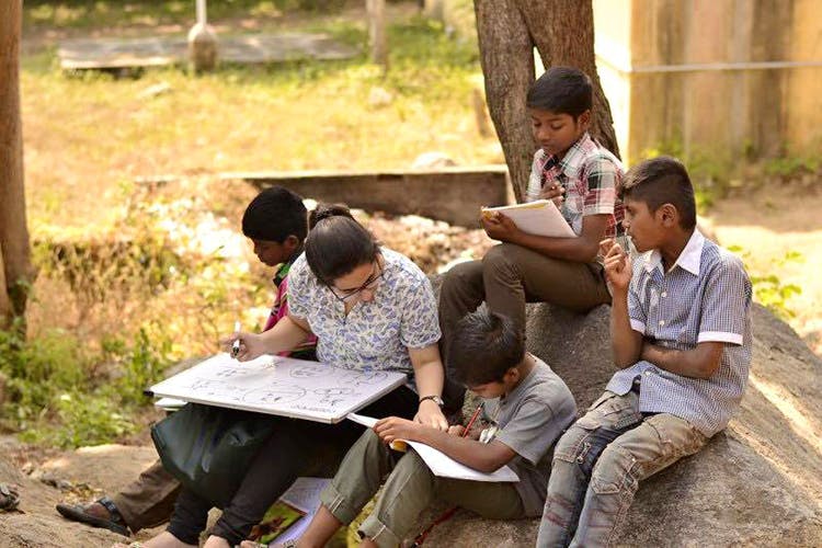 Adaptation,Community,Sitting,Child,Learning,Reading,Student,Sharing,Leisure