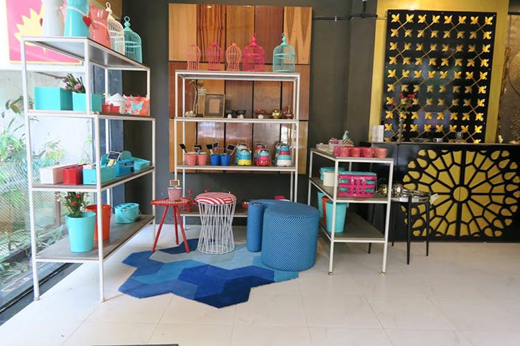 Room,Shelf,Furniture,Shelving,Interior design,Building,Turquoise,Bookcase,House,Table