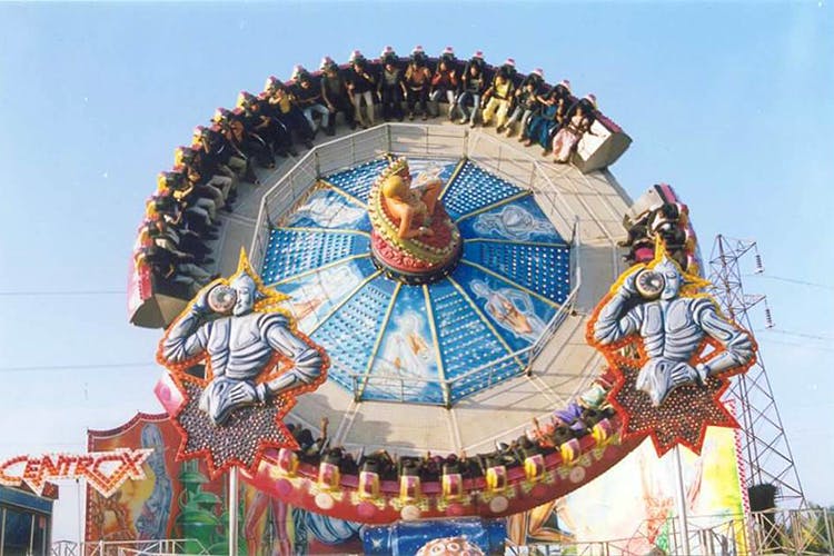 Amusement ride,Amusement park,Landmark,Fair,Fun,Park,Recreation,Tourist attraction,Sky,Festival