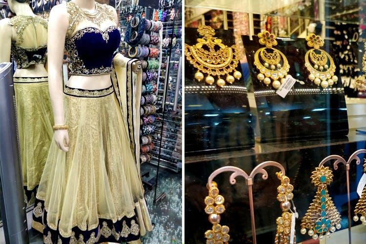 Clothing,Boutique,Dress,Fashion,Victorian fashion,Bazaar,Fashion design,Metal,Gold,Fashion accessory