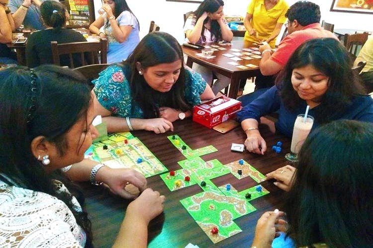 Games,Indoor games and sports,Tabletop game,Community,Recreation,Leisure,Play,Fun,Board game,Adaptation
