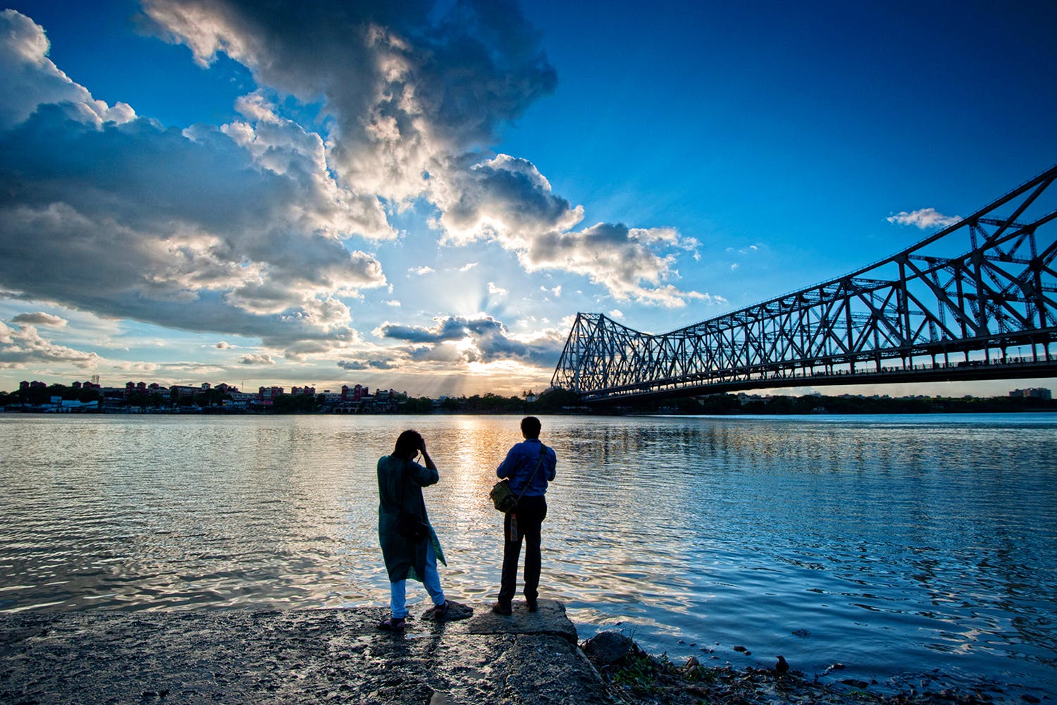 Sky,Water,Blue,Photograph,Bridge,Cloud,Reflection,Daytime,River,Horizon