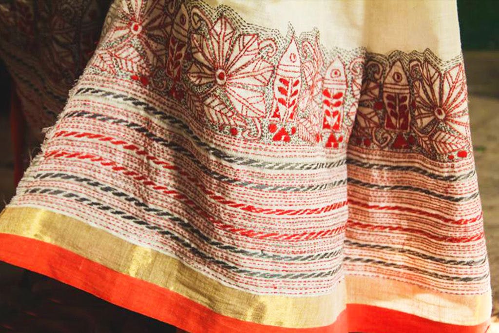 Red,Orange,Textile,Woven fabric,Wool,Pattern,Pattern,Beige,Linens