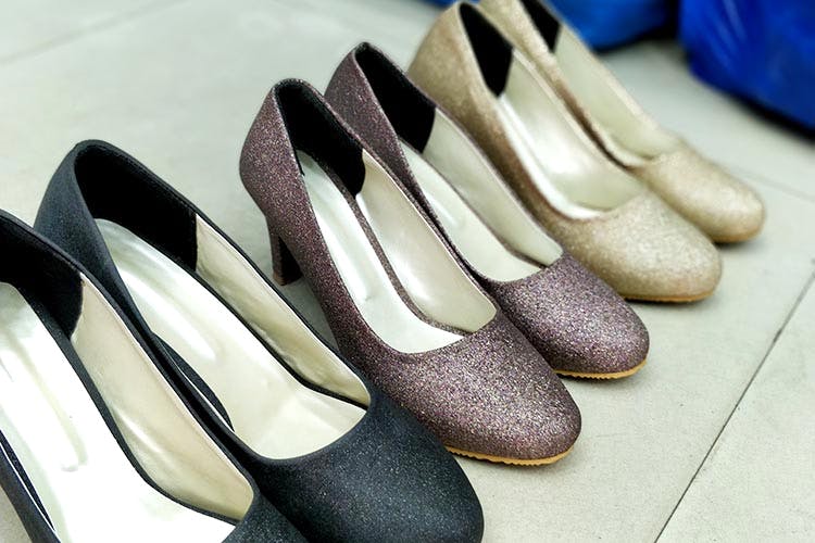 Footwear,Shoe,High heels,Leather,Ballet flat,Brand,Court shoe