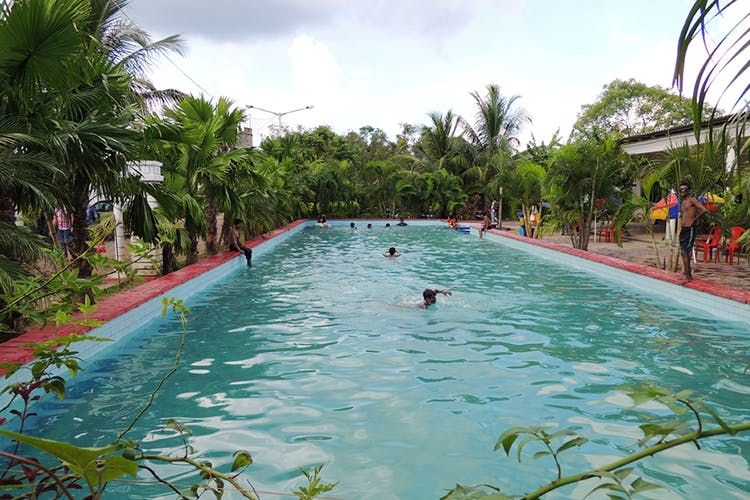 Swimming pool,Leisure,Resort,Leisure centre,Vacation,Recreation,Fun,Tree,Resort town,Water park