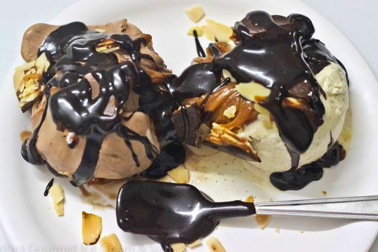 Profiterole,Cuisine,Food,Chocolate syrup,Dessert,Dish,Dame blanche,Chocolate,Ingredient,Frozen dessert