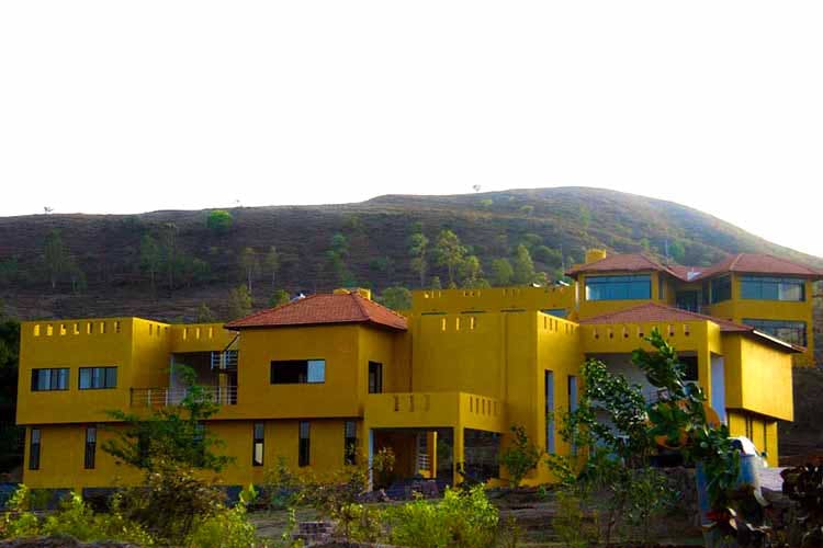 Yellow,Property,House,Residential area,Town,Architecture,Hill station,Sky,Home,Building