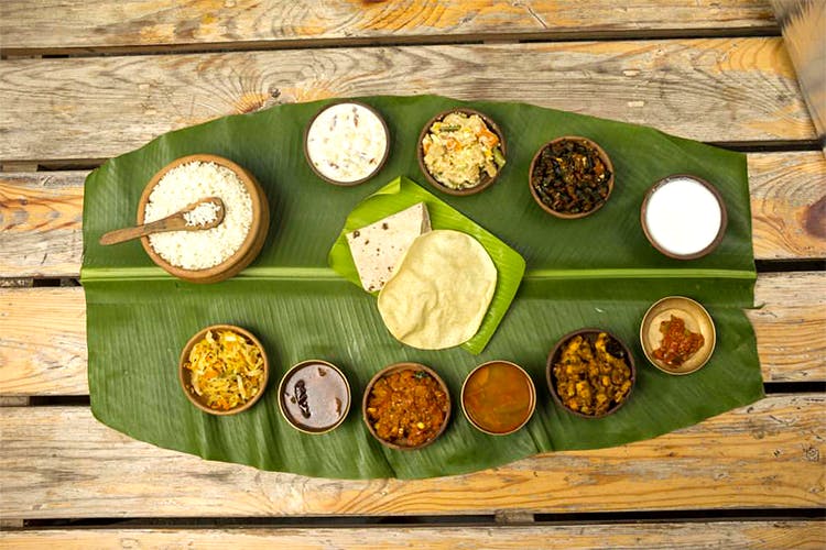 Cuisine,Sadya,Food,Dish,Vegetarian food,Banana leaf,Indian cuisine,Delicacy,Comfort food,Meal