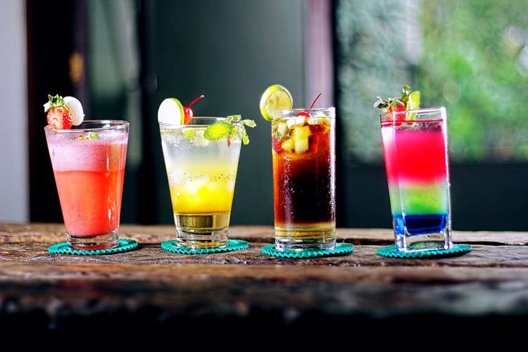 Drink,Juice,Non-alcoholic beverage,Rum swizzle,Alcoholic beverage,Distilled beverage,Cocktail garnish,Cocktail,Italian soda,Beer cocktail