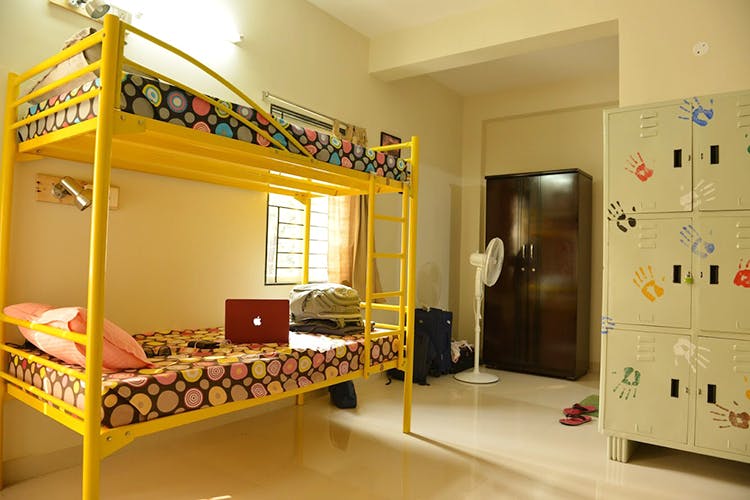 Room,Interior design,Yellow,Bed,Furniture,Building,Ceiling,House,Floor,Architecture