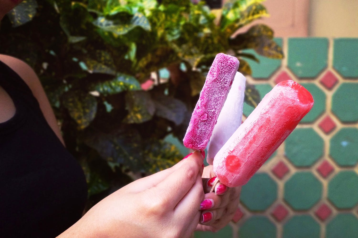 Pink,Finger,Ice pop,Material property,Hand,Nail,Food,Plant,Frozen dessert