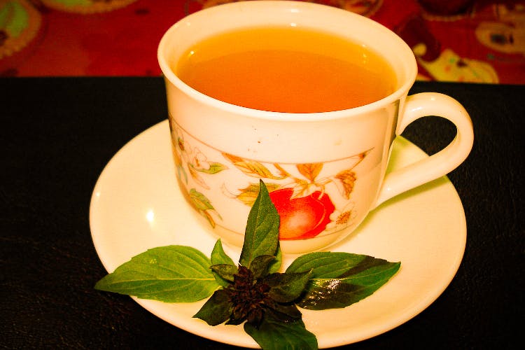 Cup,Cup,Coffee cup,Drink,Chinese herb tea,Drinkware,Saucer,Food,Teacup,Tea