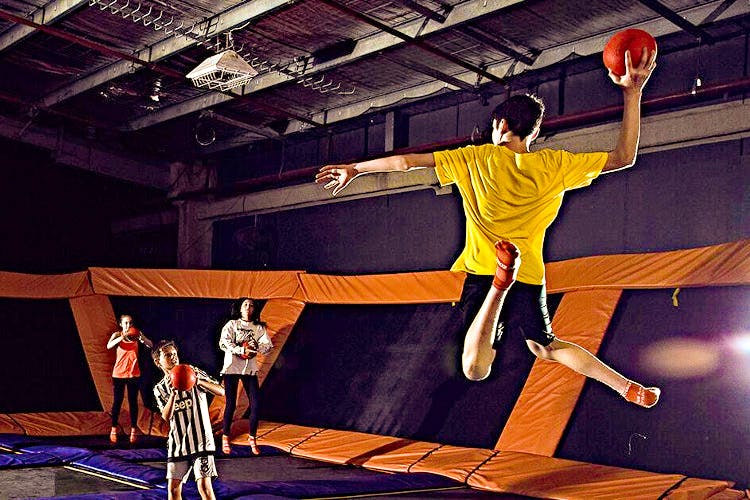 Performance,Acrobatics,Performing arts,Flip (acrobatic),Event,Balance,Basketball moves,Street stunts,Basketball,Performance art