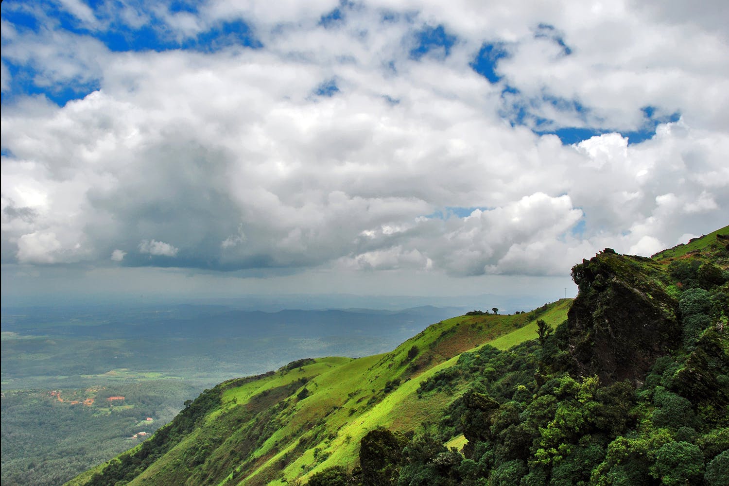 Sky,Nature,Highland,Cloud,Mountainous landforms,Green,Natural landscape,Hill,Mountain,Hill station