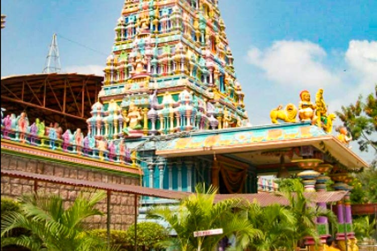 Building,Hindu temple,Temple,Place of worship,Architecture,Condominium,Temple,Leisure,Tourism,Wat