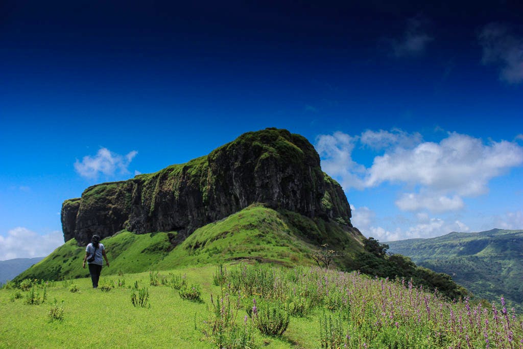 Mountainous landforms,Mountain,Sky,Natural landscape,Nature,Highland,Green,Mountain range,Grassland,Hill