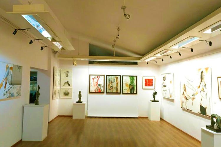 Art gallery,Museum,Building,Tourist attraction,Interior design,Art exhibition,Exhibition,Room,Ceiling,Collection