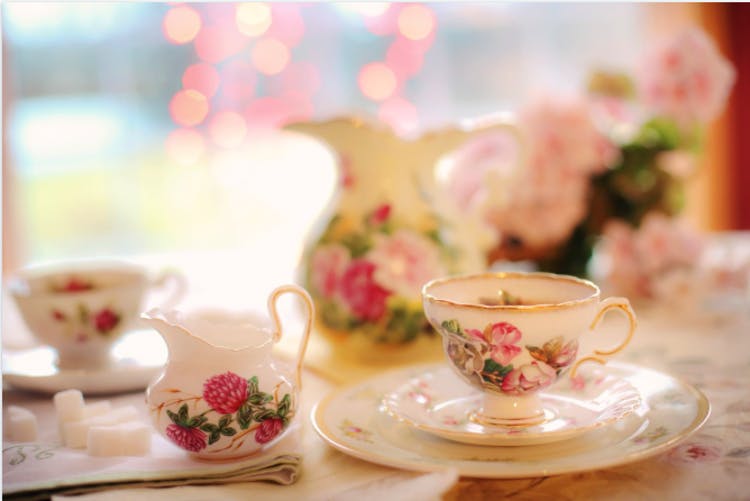 Cup,Teacup,Porcelain,Tableware,Coffee cup,Saucer,Cup,Drinkware,Serveware,Pink