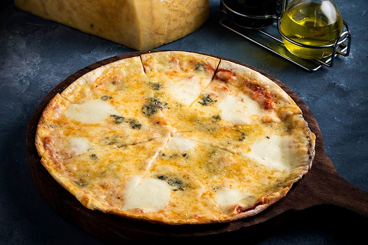 Dish,Food,Cuisine,Ingredient,Pizza,Pizza cheese,Flatbread,Baked goods,Recipe,Tarte flambée