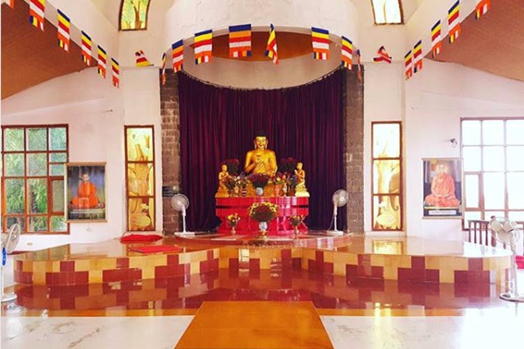 Decoration,Place of worship,Temple,Hindu temple,Shrine,Interior design,Building,Room,Altar,Hall