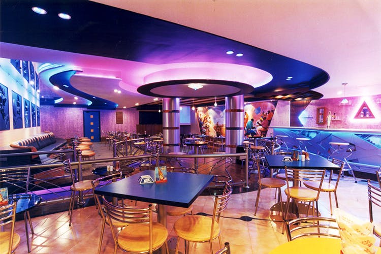 Building,Interior design,Purple,Ceiling,Restaurant,Room,Bar,Leisure,Architecture,Nightclub