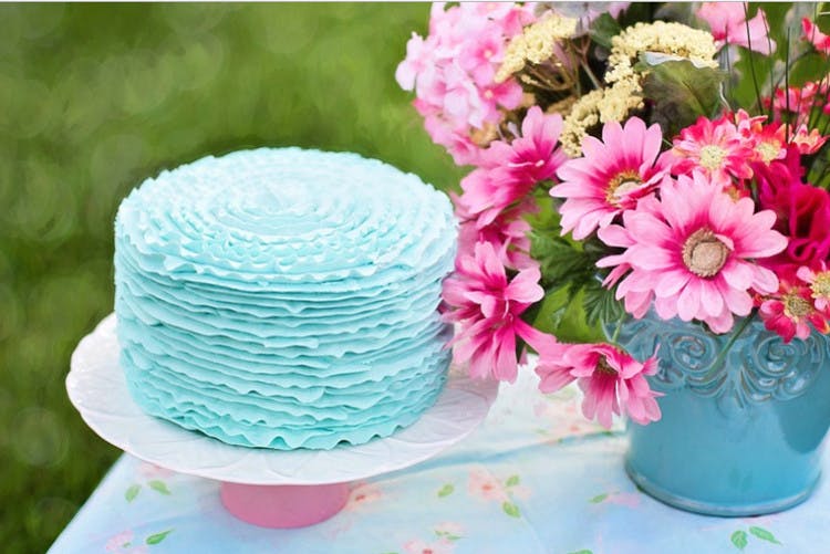 Pink,Turquoise,Cake decorating,Flower,Buttercream,Icing,Dessert,Plant,Petal,Baking