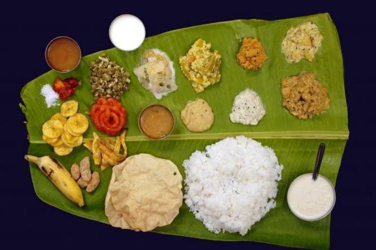 Dish,Food,Cuisine,Sadya,Banana leaf rice,Meal,White rice,Andhra food,Steamed rice,Ingredient