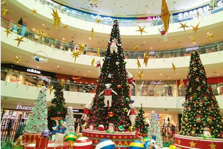 Christmas tree,Christmas decoration,Christmas,Christmas ornament,Tree,Christmas eve,Shopping mall,Architecture,Interior design,Event
