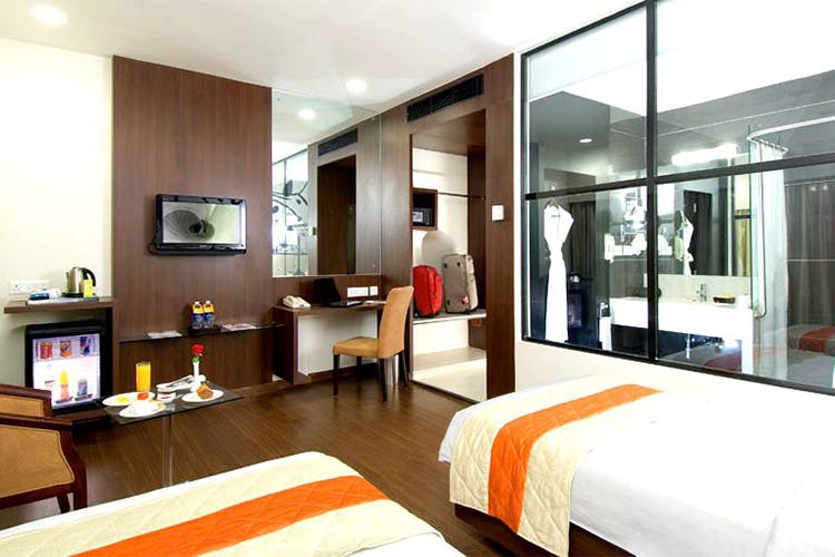 Room,Bedroom,Furniture,Bed,Interior design,Property,Building,Suite,Bed frame,Architecture