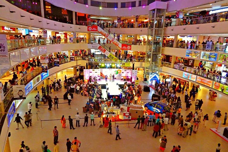 Shopping mall,Building,Retail,Shopping,Crowd,Event,Service,Outlet store,Leisure,Business