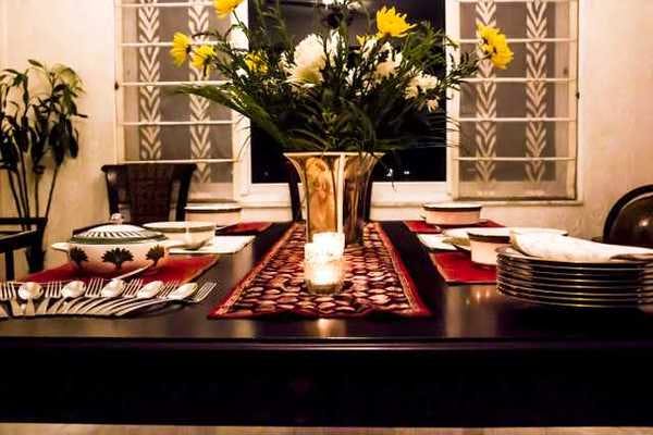 Table,Room,Furniture,Interior design,Dining room,Brunch,Coffee table,Textile,Tablecloth,Floor