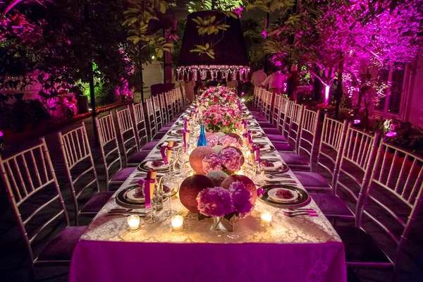 Decoration,Photograph,Purple,Function hall,Lighting,Pink,Wedding reception,Aisle,Violet,Banquet