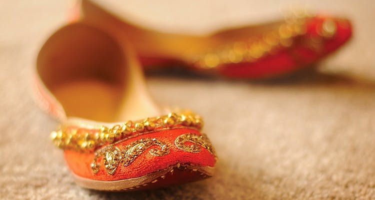 Footwear,Red,Close-up,Shoe,Gold,Fashion accessory,Lip,High heels,Finger,Jewellery
